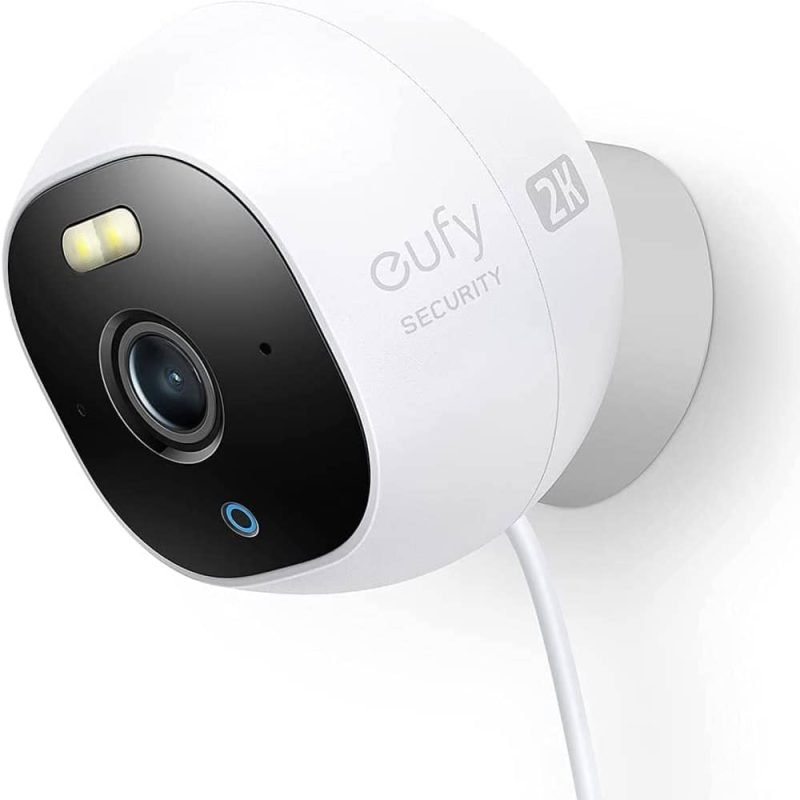 Mains powered outdoor camera mounted by a door